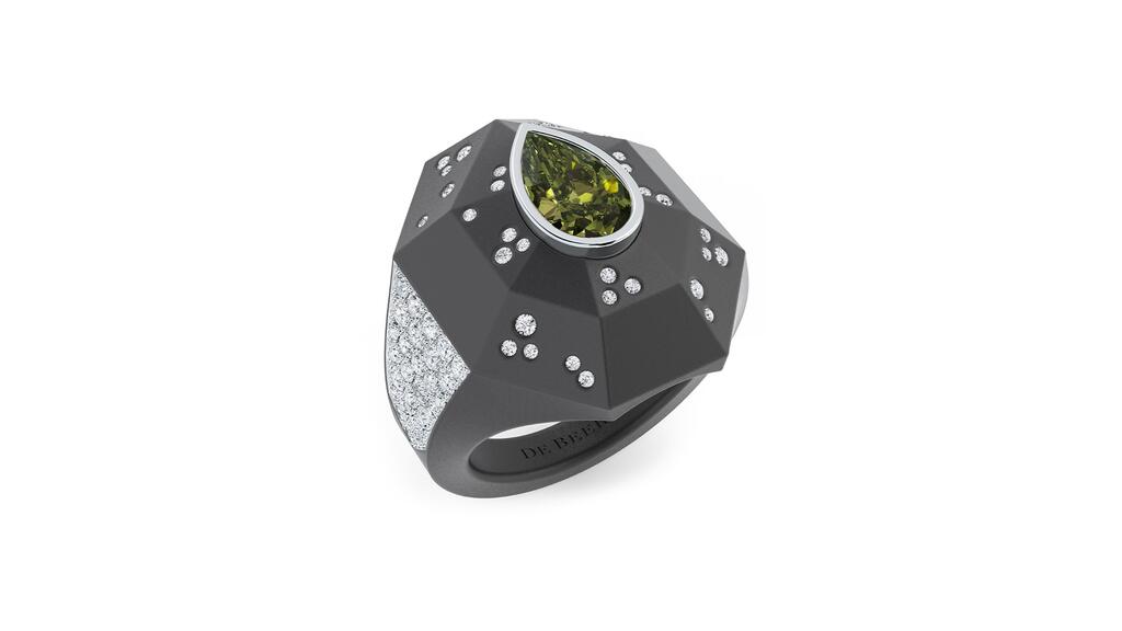 A signet ring made of brushed titanium with a 2.01-carat fancy deep brownish greenish yellow pear-shaped diamond in a white gold bezel setting (All pieces are price upon request) De Beers high jewelry Fortitude Signet Ring